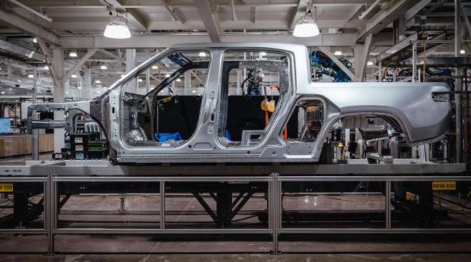 Rivian R1T electric vehicle on assembly line